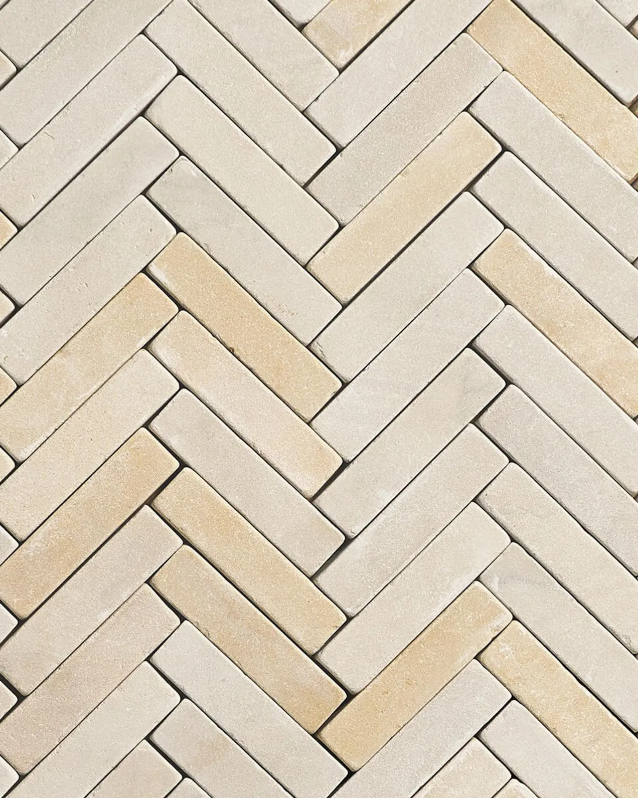 Mint sandstone cobbles laid in herringbone
