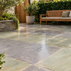 Natural sandstone paving in a modern garden patio showing texture and color variation