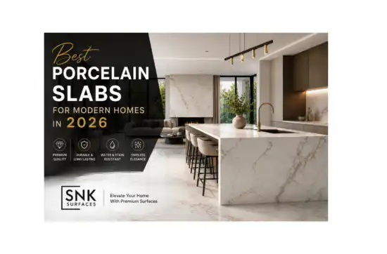 Luxury modern kitchen and living room featuring white marble-look porcelain slabs with gold veining by SNK Surfaces, ideal for contemporary home interiors in 2026.