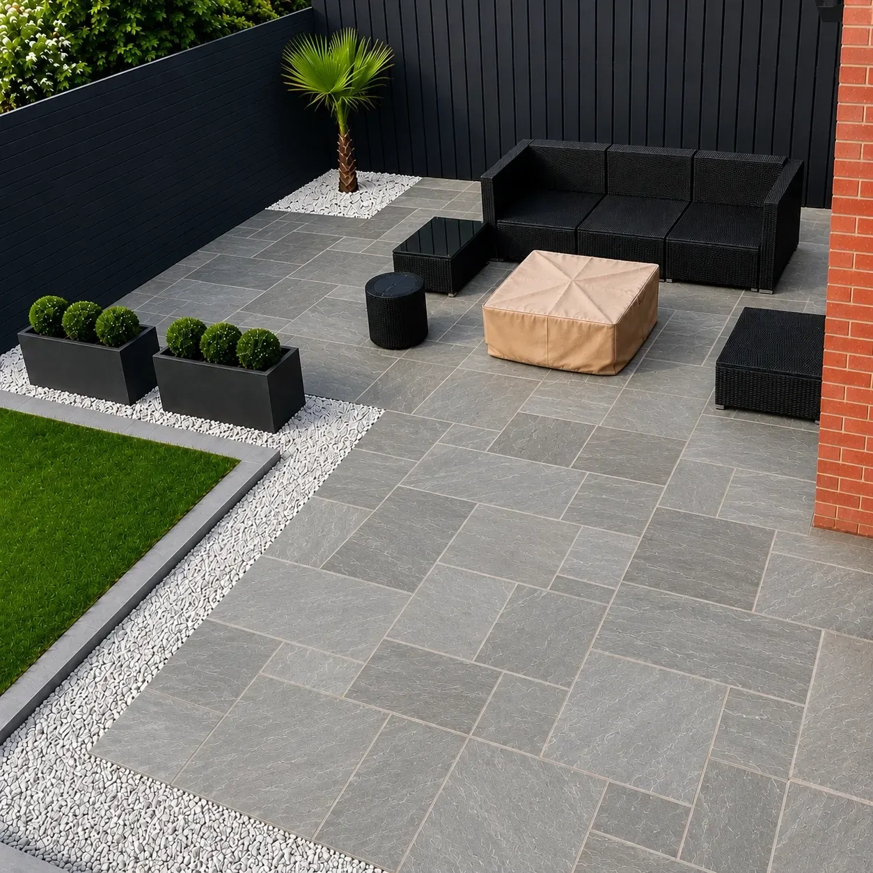 Kandla Grey sandstone patio with black fencing