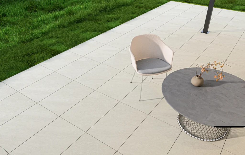 Quartz White porcelain paving slabs with outdoor furniture, close view